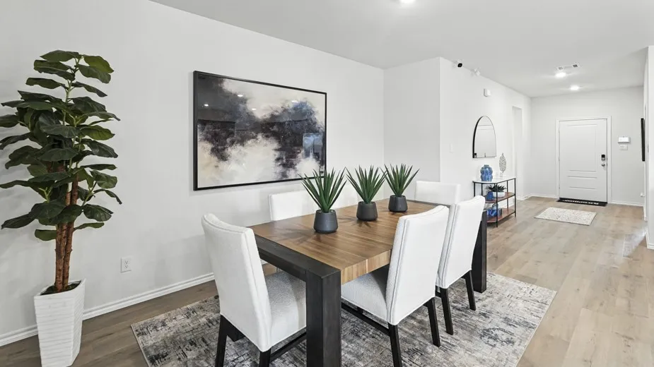 Dining space featuring light wood-type flooring and recessed lighting