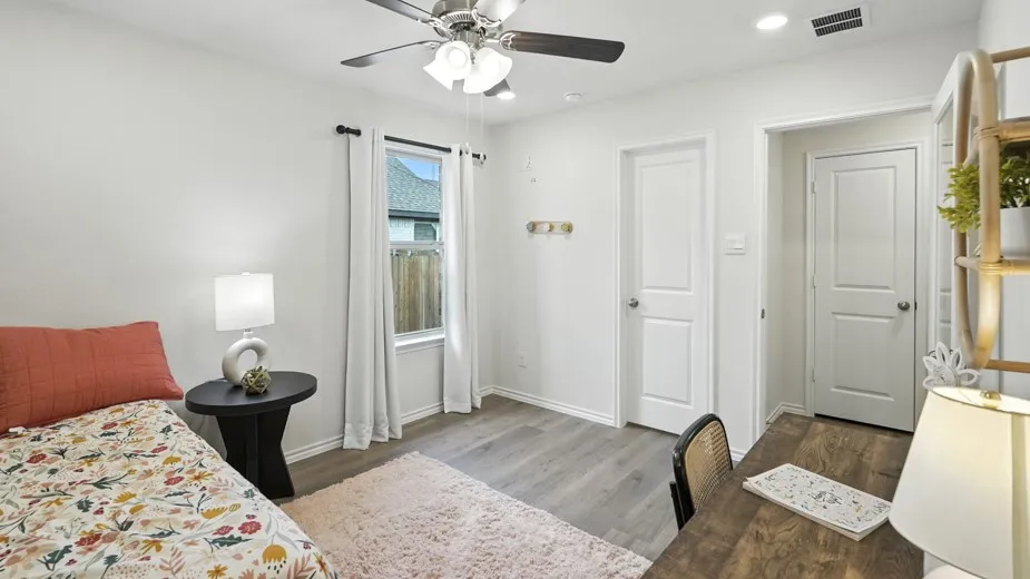 Bedroom featuring a ceiling fan, light wood-style floors, and recessed lighting