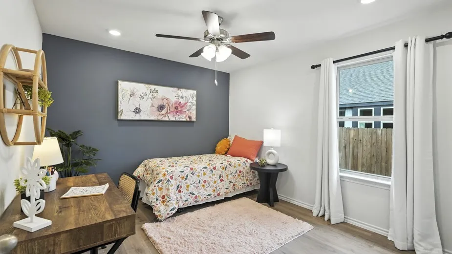 Bedroom featuring a ceiling fan, wood finished floors, recessed lighting, and an office area