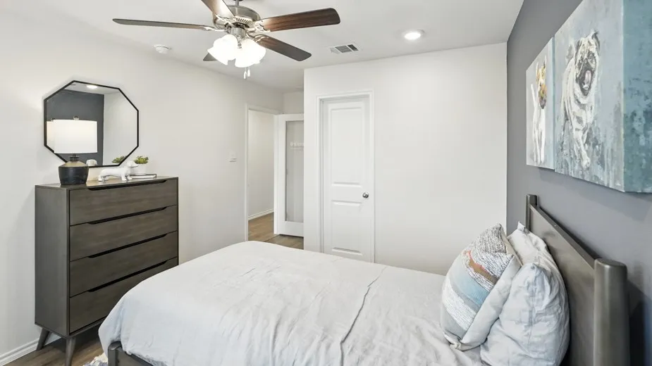 Bedroom with ceiling fan, recessed lighting, and dark wood-type flooring