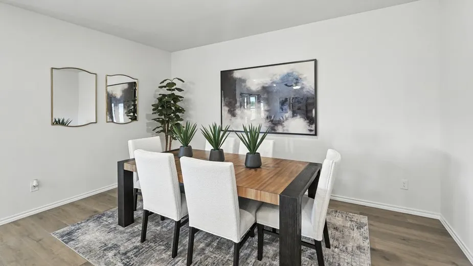 Dining room featuring baseboards and wood finished floors