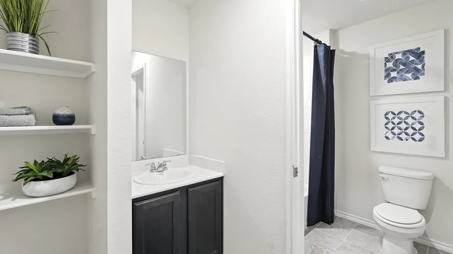 Bathroom featuring vanity, a shower with shower curtain, and light tile patterned​​‌​​​​‌​​‌‌​‌‌​​​‌‌​‌​‌​‌​​​‌​​ floors