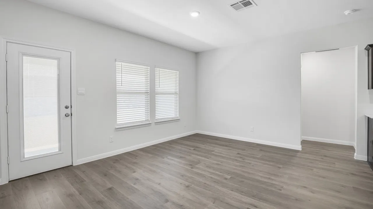 Entryway featuring dark wood-type flooring and recessed lighting