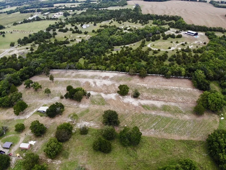 View of property location featuring rural landscape and farmland
