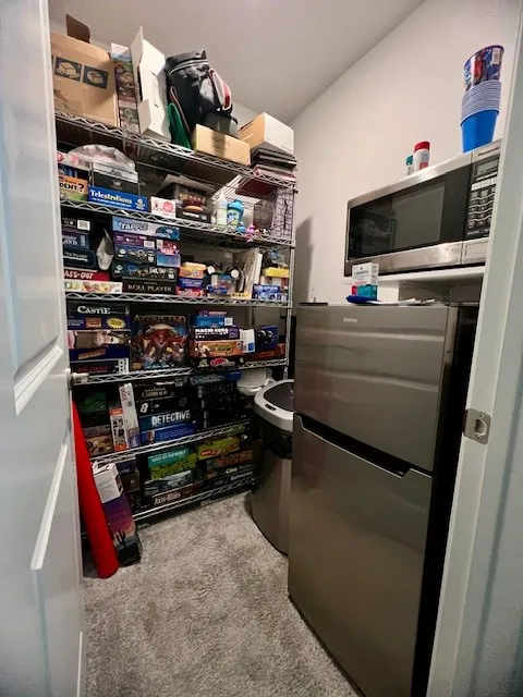 Closet in upstairs living space enough for a  small fridge and lots of storage.
