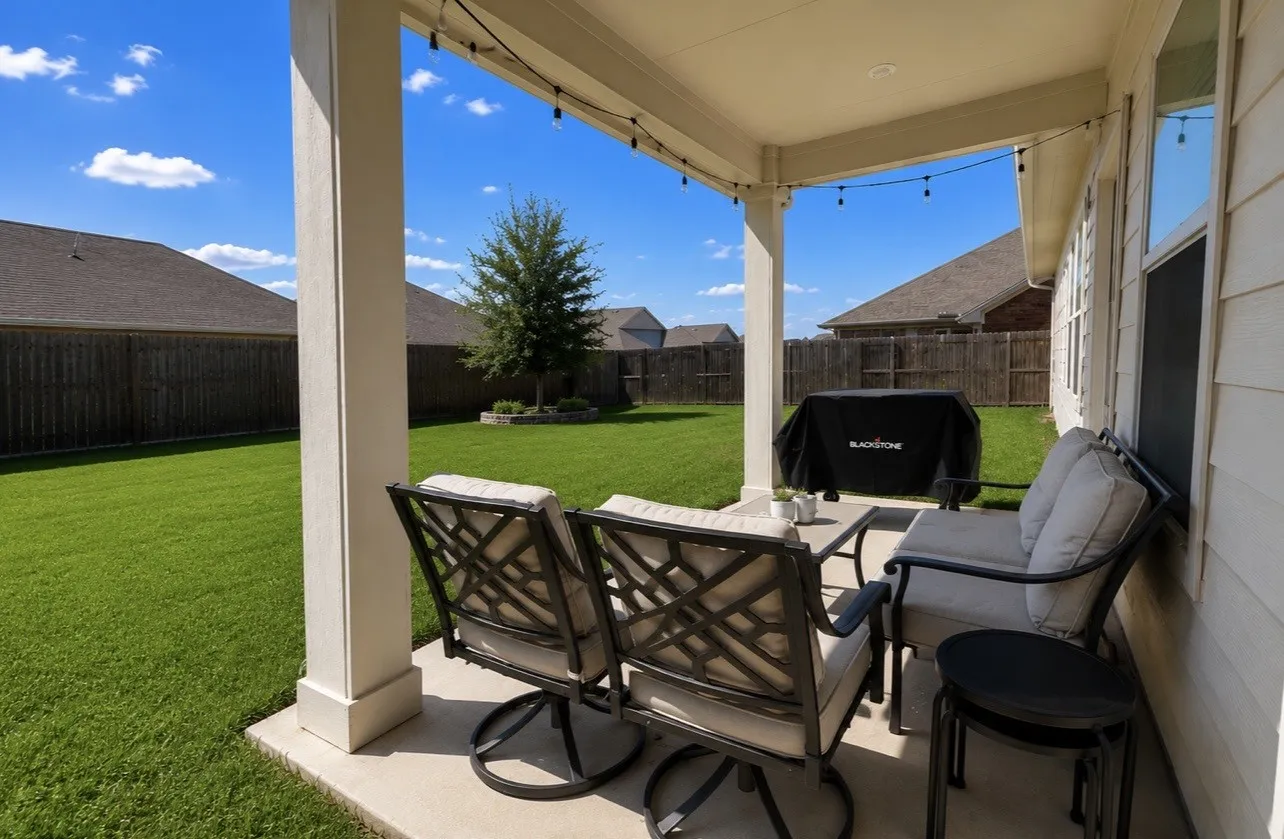 Great covered back patio for grilling.