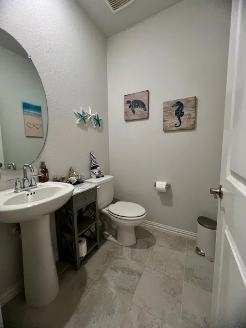 Half bath downstairs for guest to use.