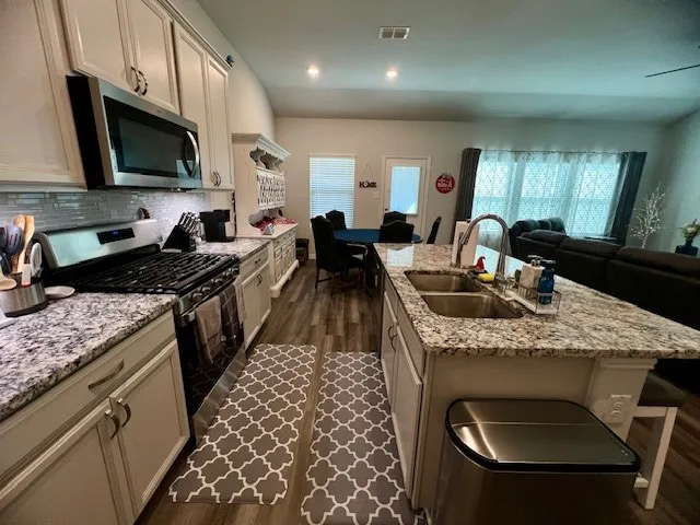 Kitchen with over sized island .