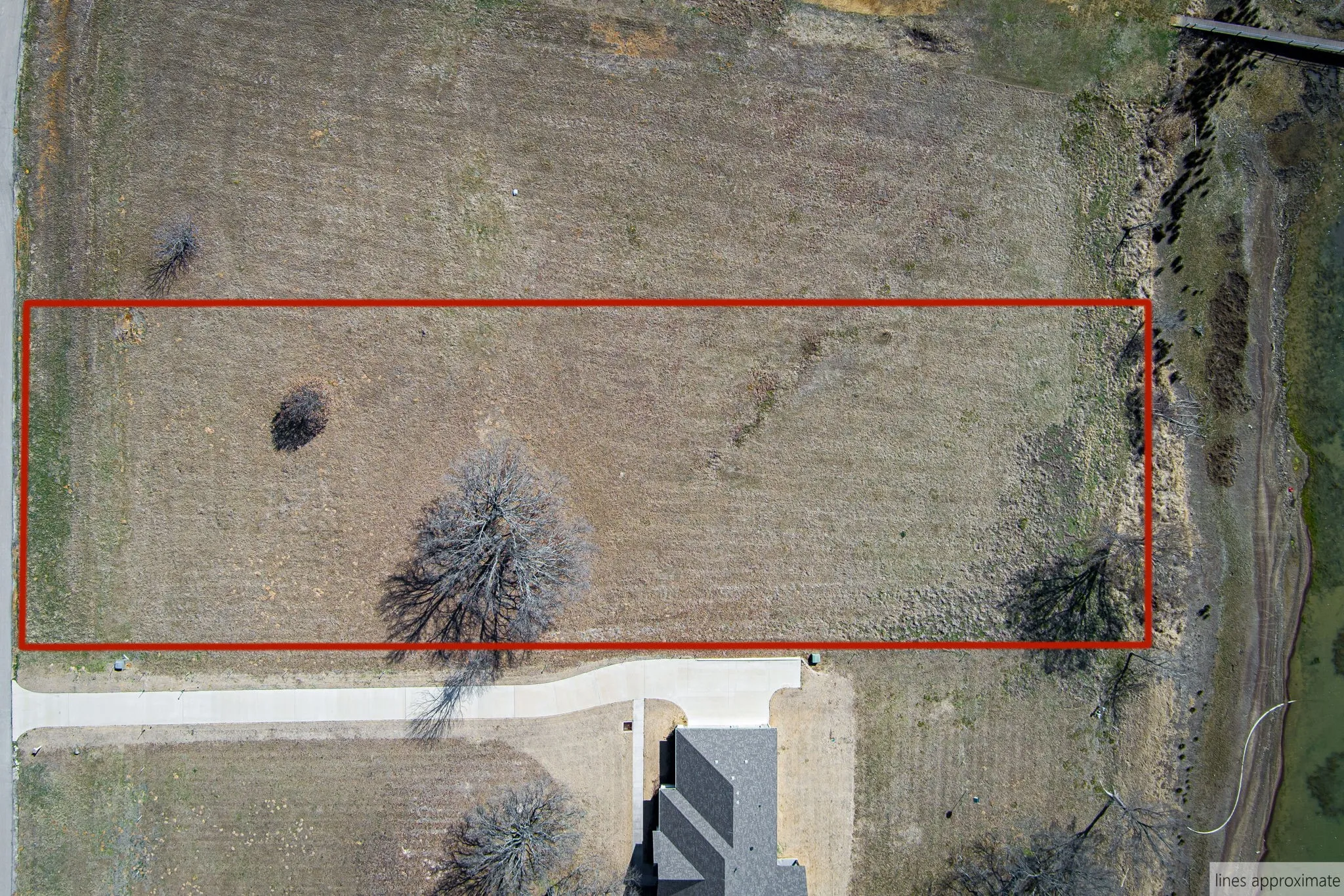 Aerial view of property's location featuring property parcel outlined