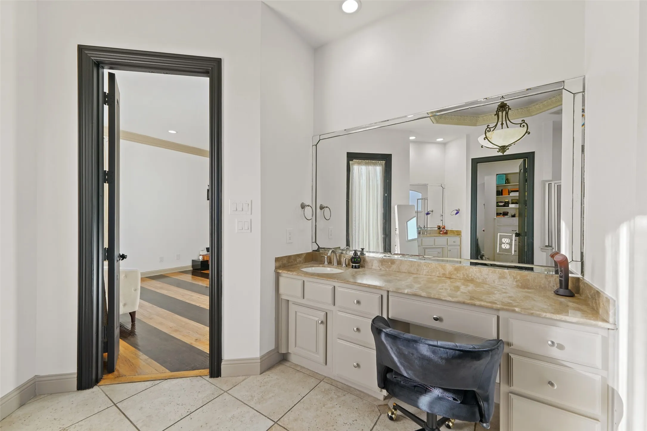 Full bathroom featuring vanity, light tile patterned flooring, and recessed lighting