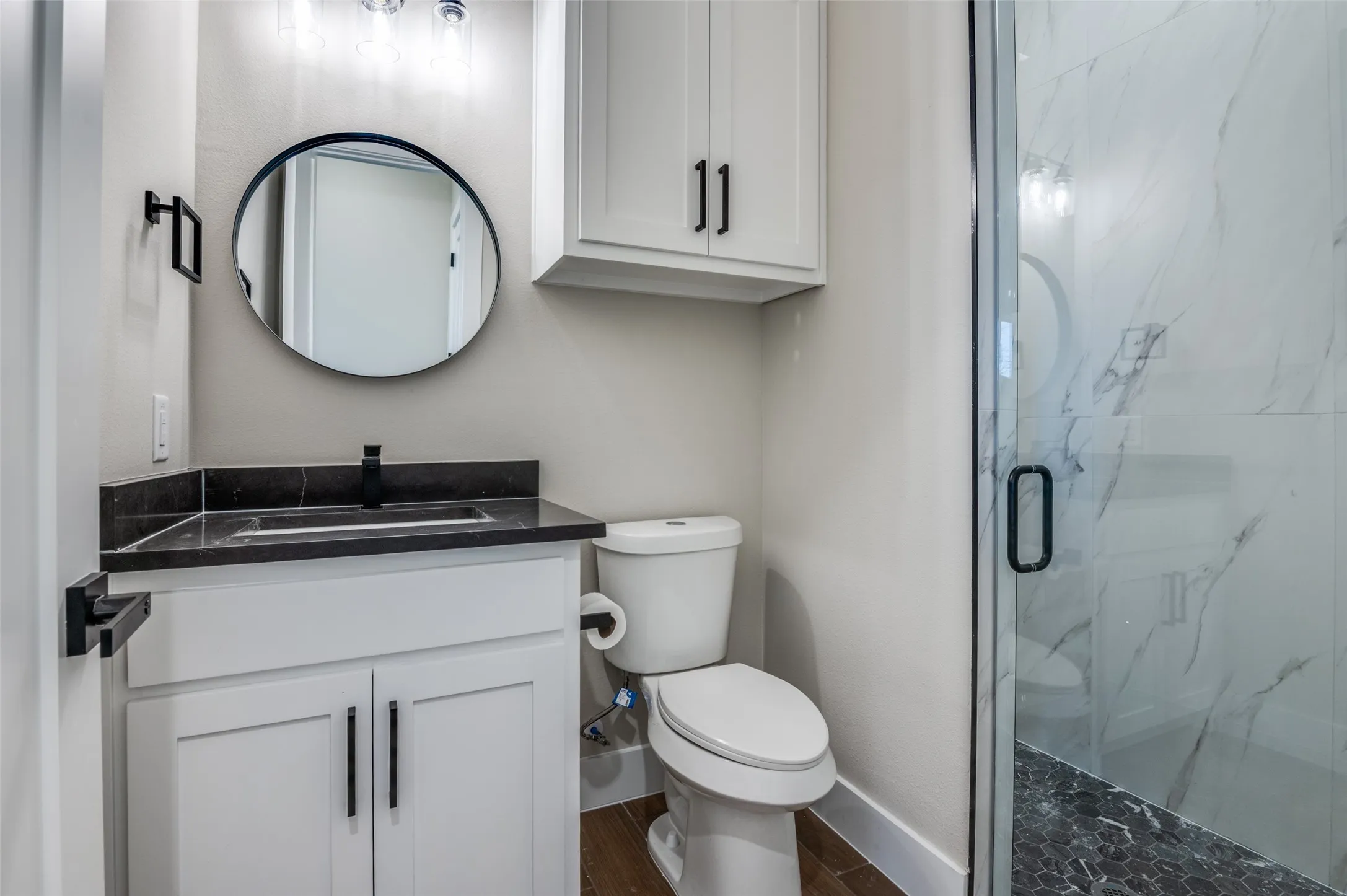 Guest bathroom with large walk in shower