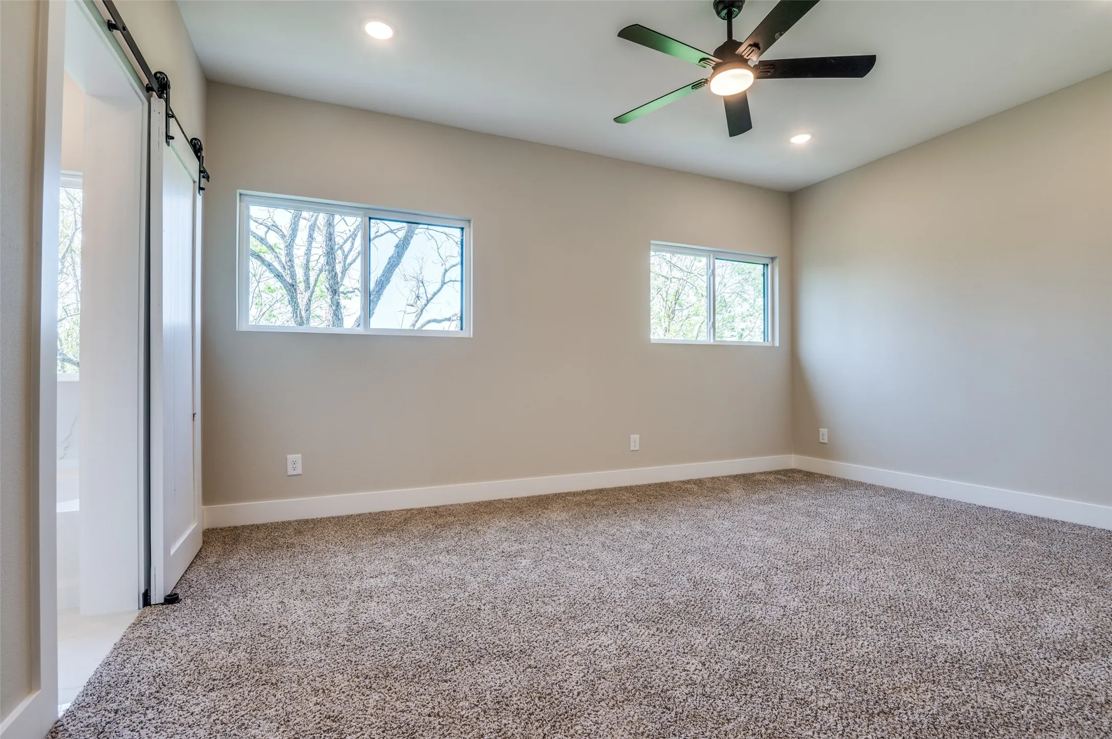 Primary bedroom with tranquil views