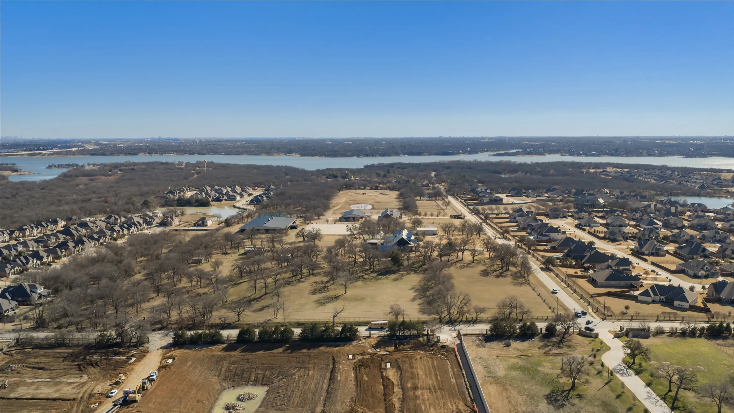Property View Showing East And West Homes in Front and BehiProperty