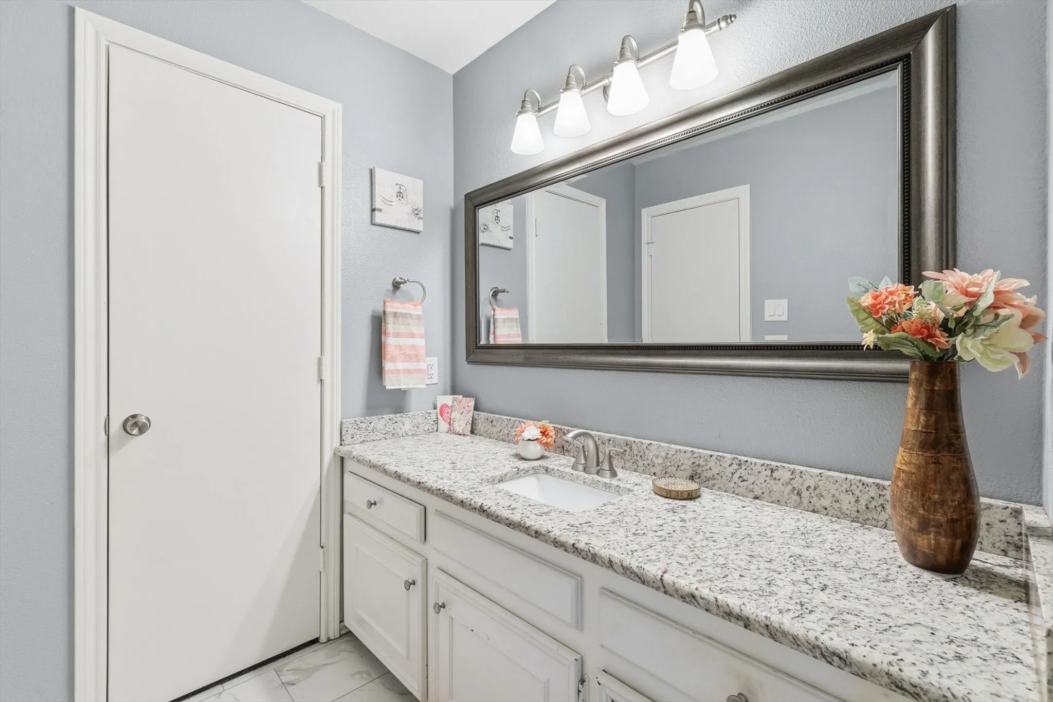 Separate primary suite space with walk-in closet