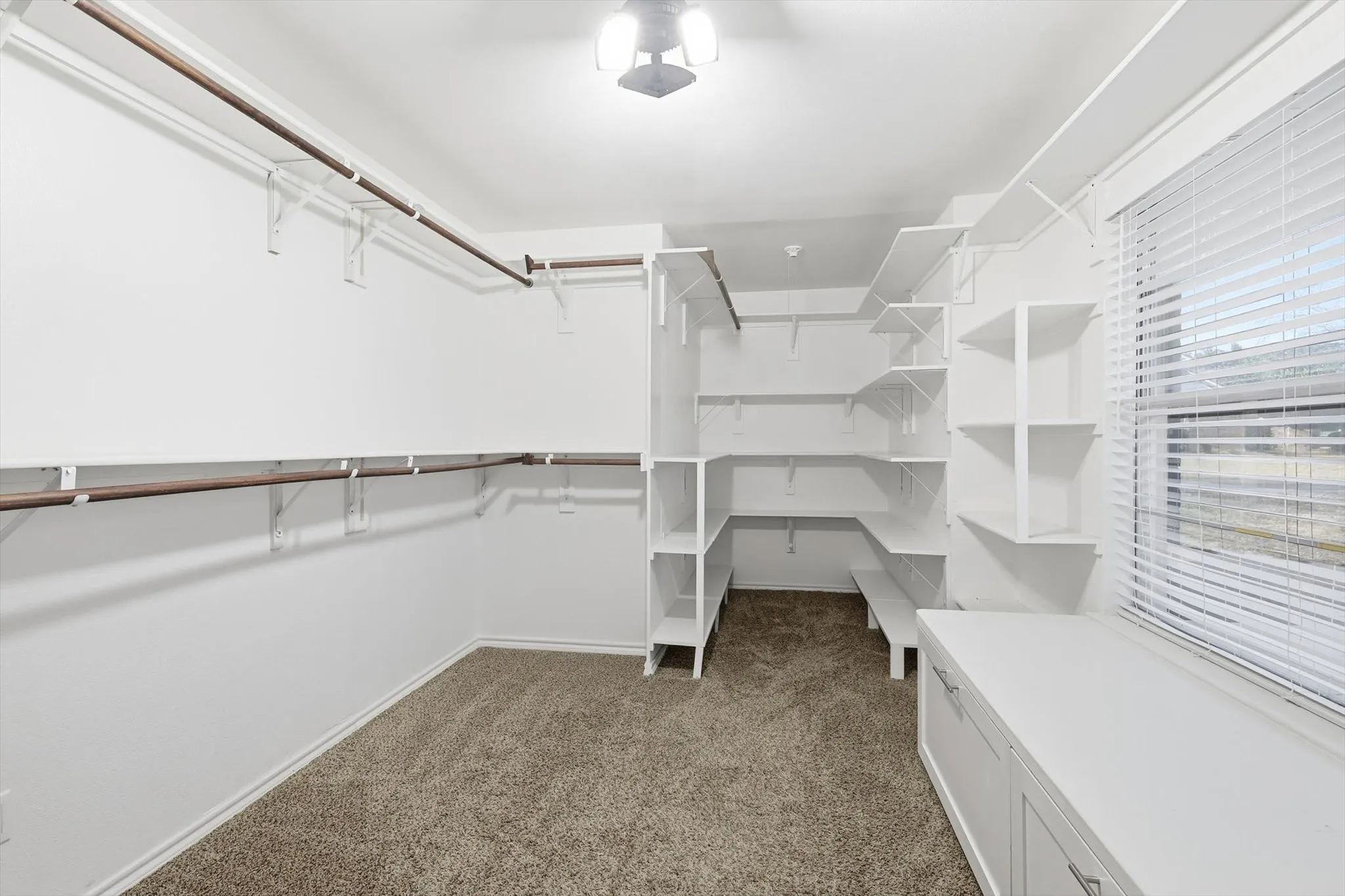 Dream-worthy custom closet with exceptional space and organization.