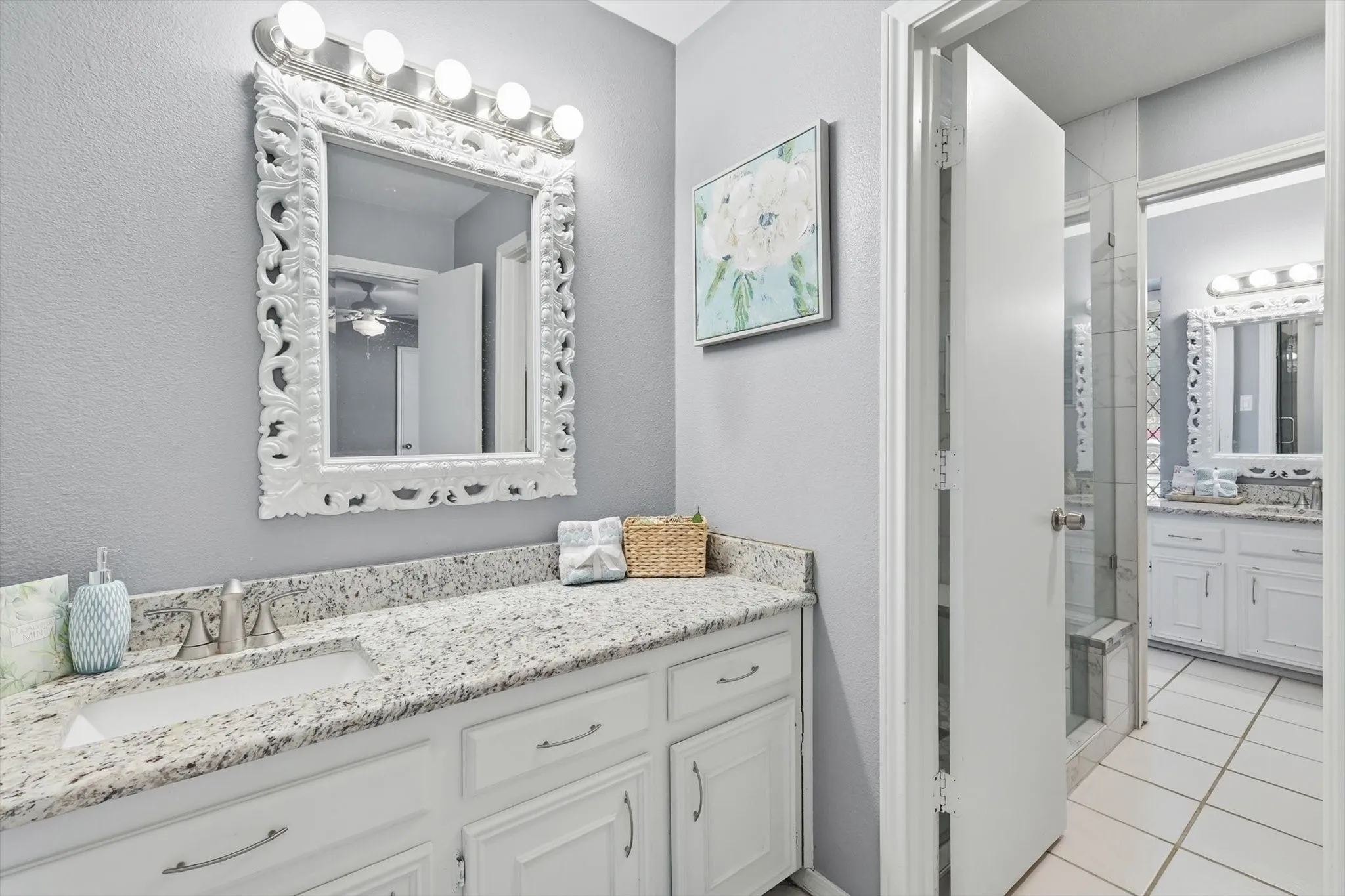 Convenient shared bath, second private vanity space