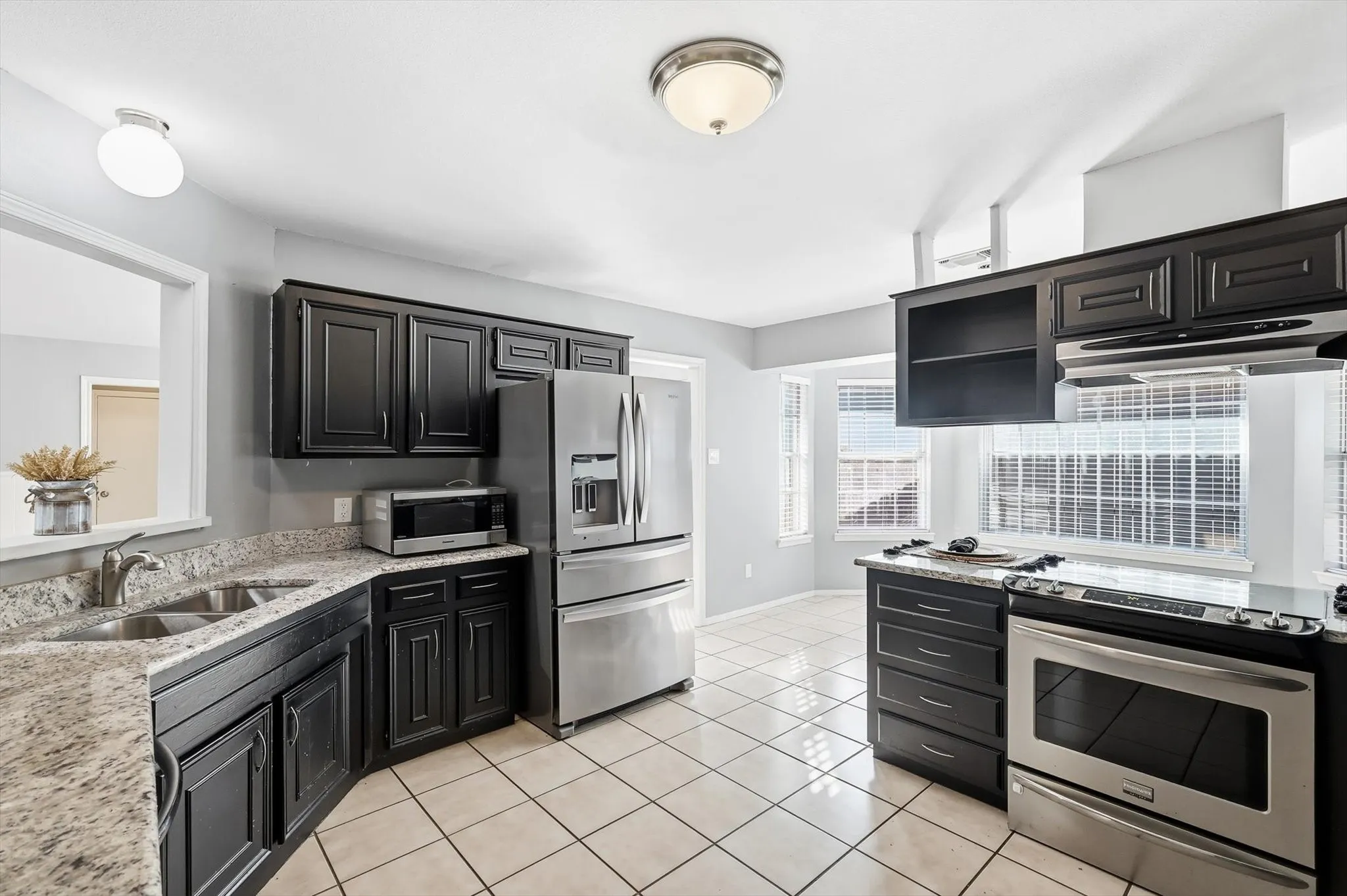 Light-filled kitchen with cozy dining space for everyday meals.