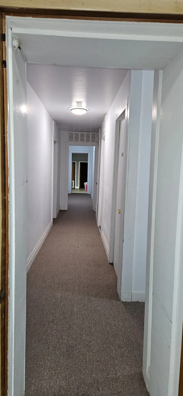 Hallway with baseboards