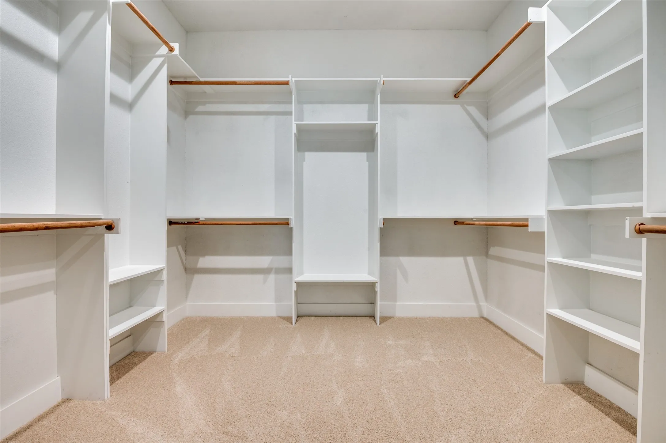 Large walk-in closet in primary suite