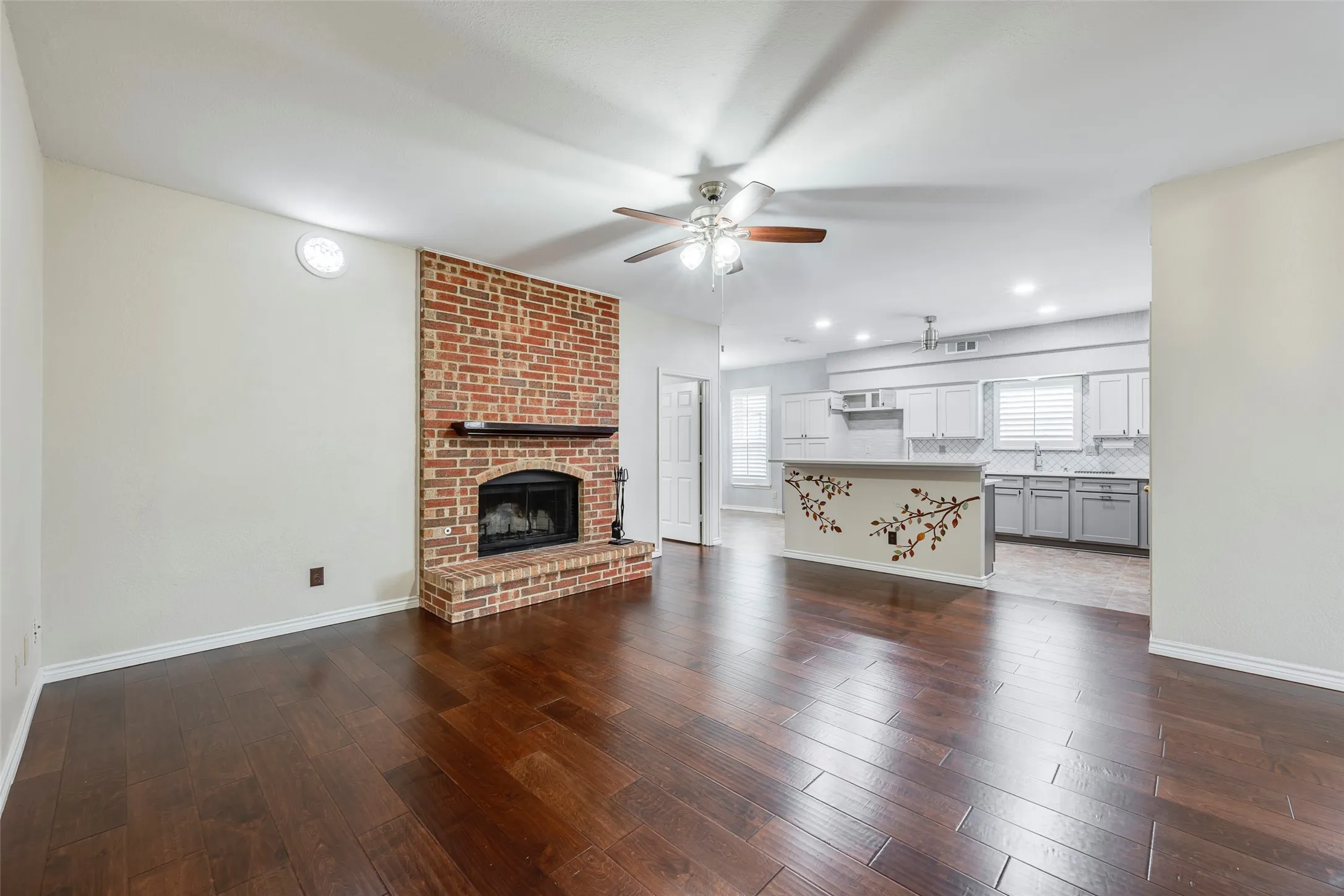 Wood burning Fireplace with gas starter in Family Den area