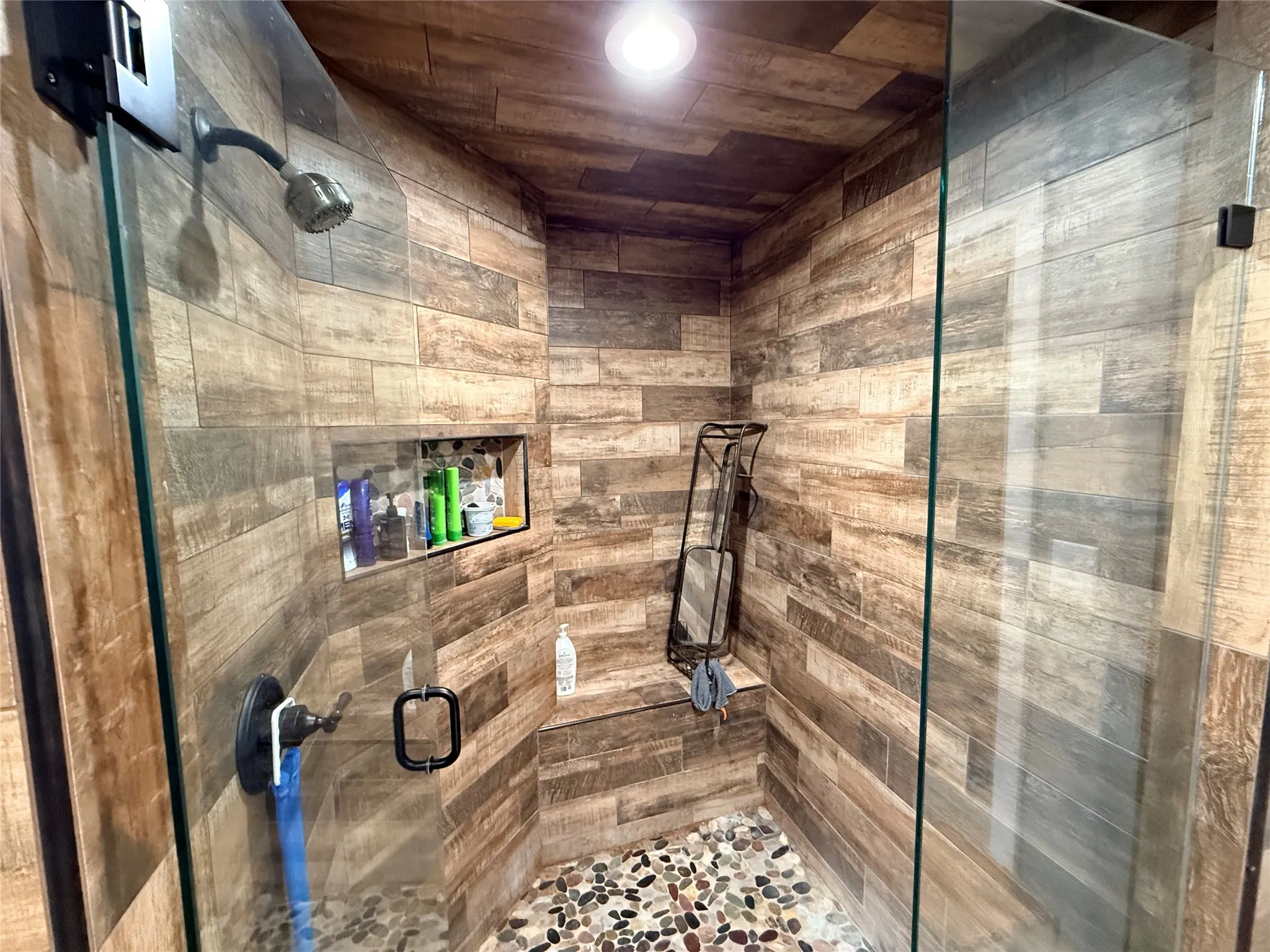 Full bathroom with a stall shower