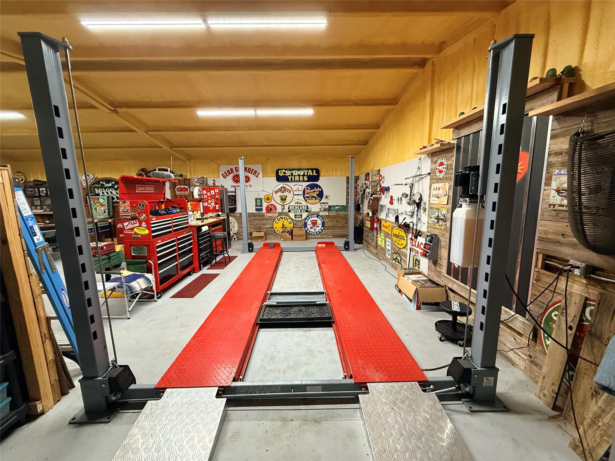 Garage featuring a workshop area