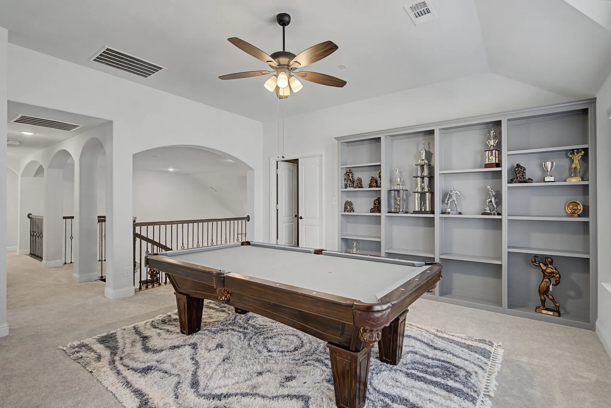 Rec room featuring billiards table, light colored carpet, and ceiling fan