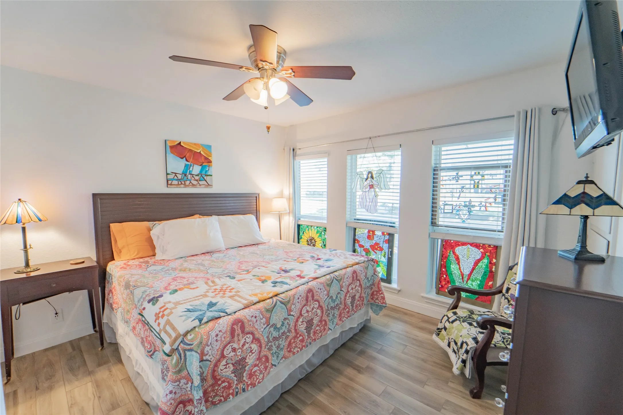 Guest wing bedroom (#3) -great windows overlooking the outdoor pool and pavilion area!