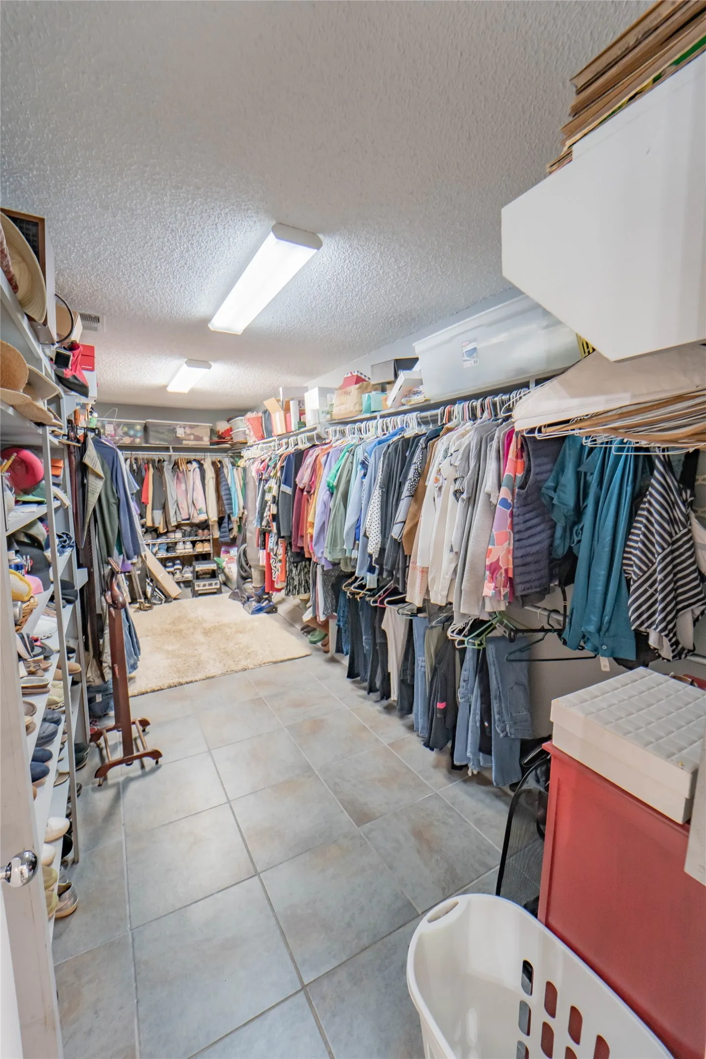 Primary bedroom closet-a great sized walk in closet with access from en-suite bath-