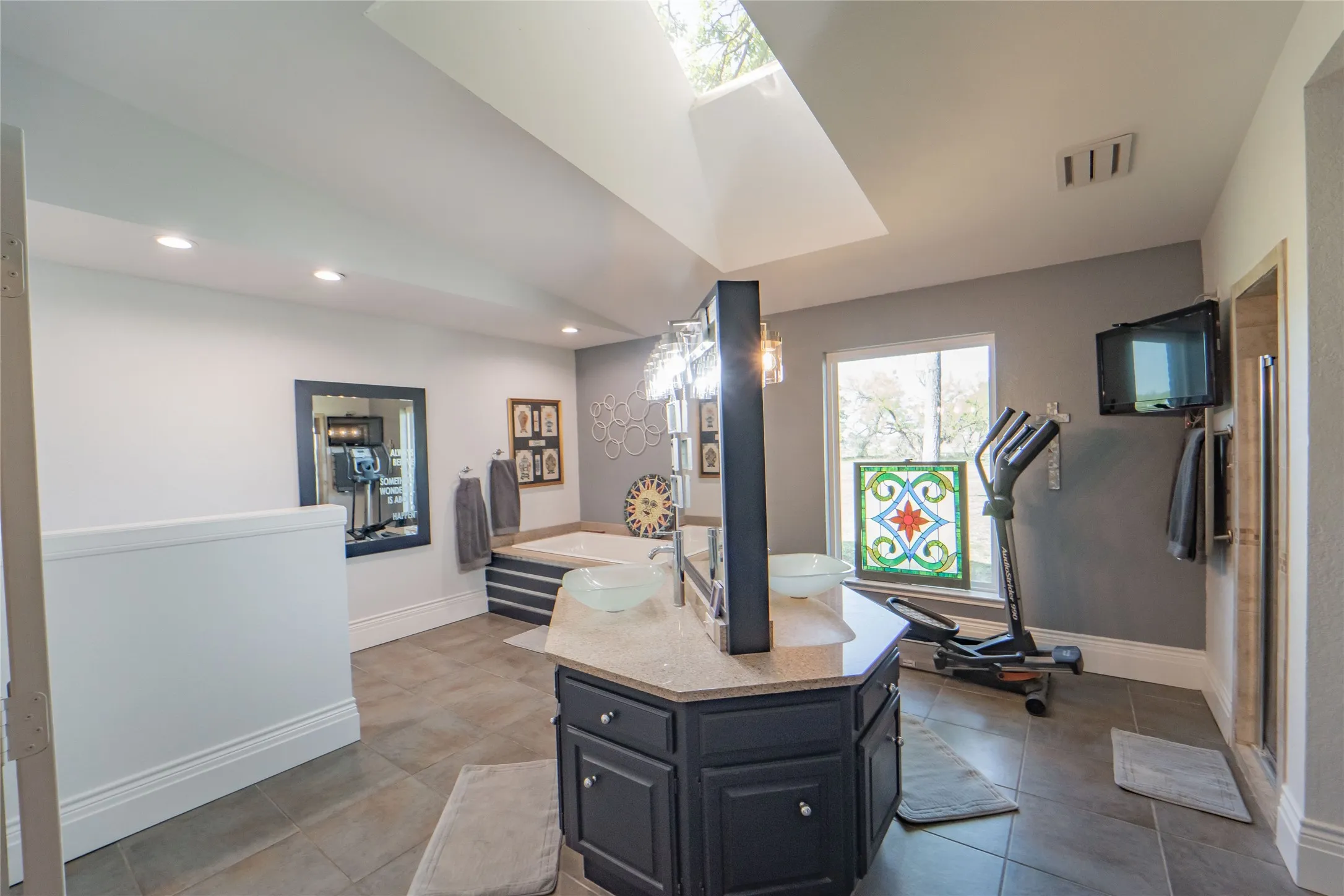 Spa-Like Primary En-Suite offers double vanities, walk in shower with heated towel bar, jetted tub, built-ins and an extra-large walk in closet!