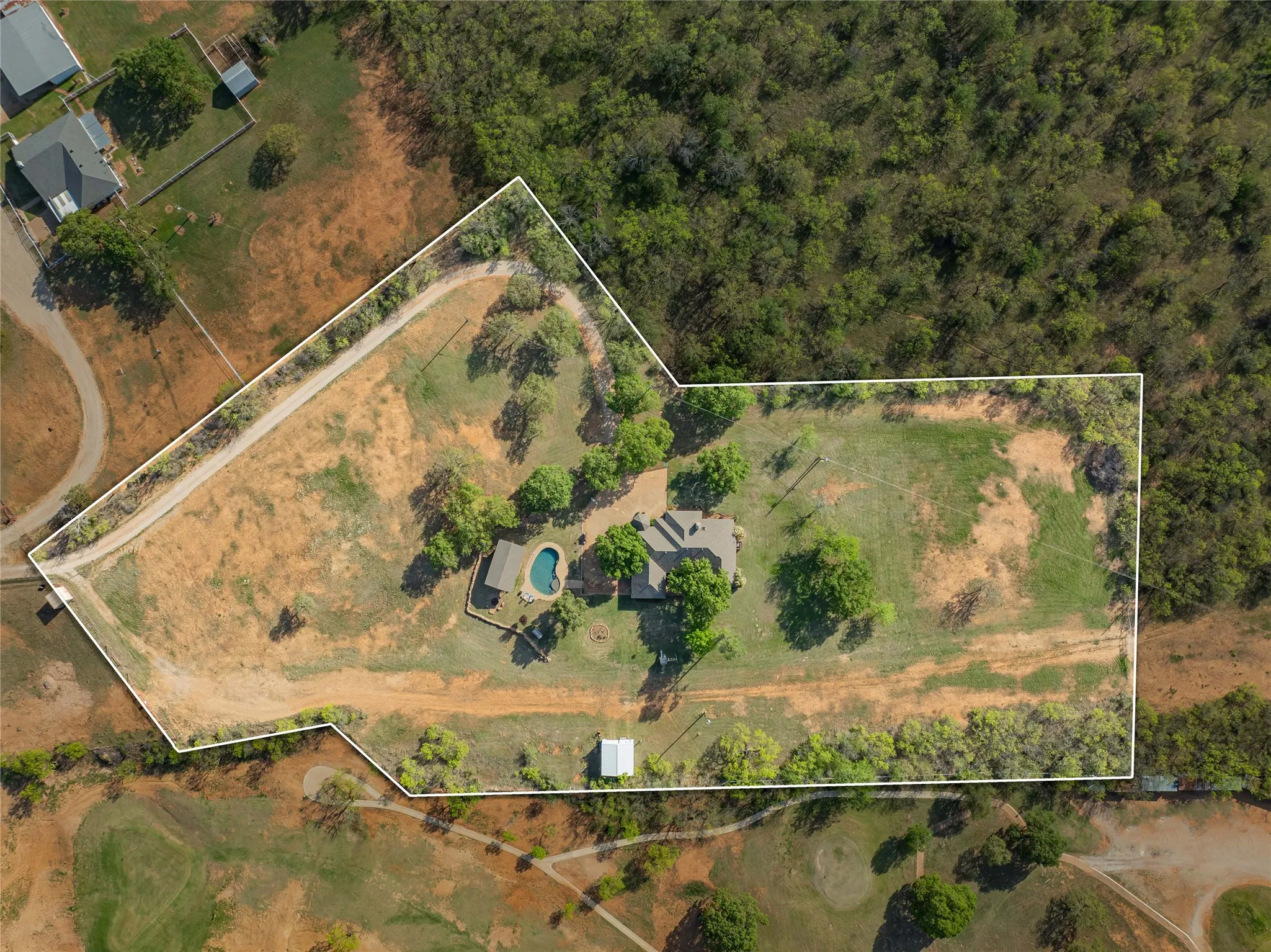 Aerial view of property's location featuring property boundaries highlighted