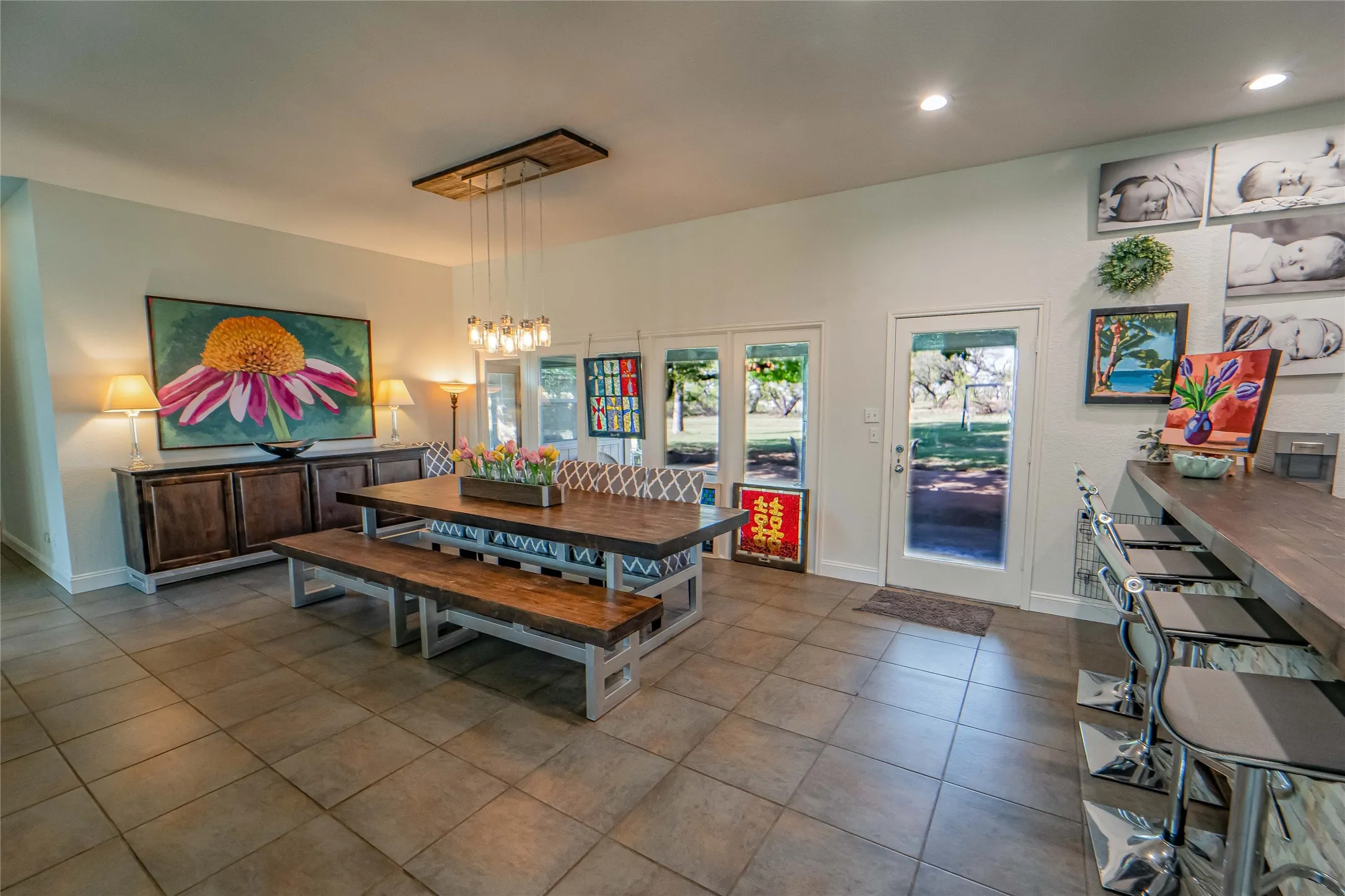 Expansive dining area and wet bar-great for large gatherings, with views and access to the outdoor covered patio-