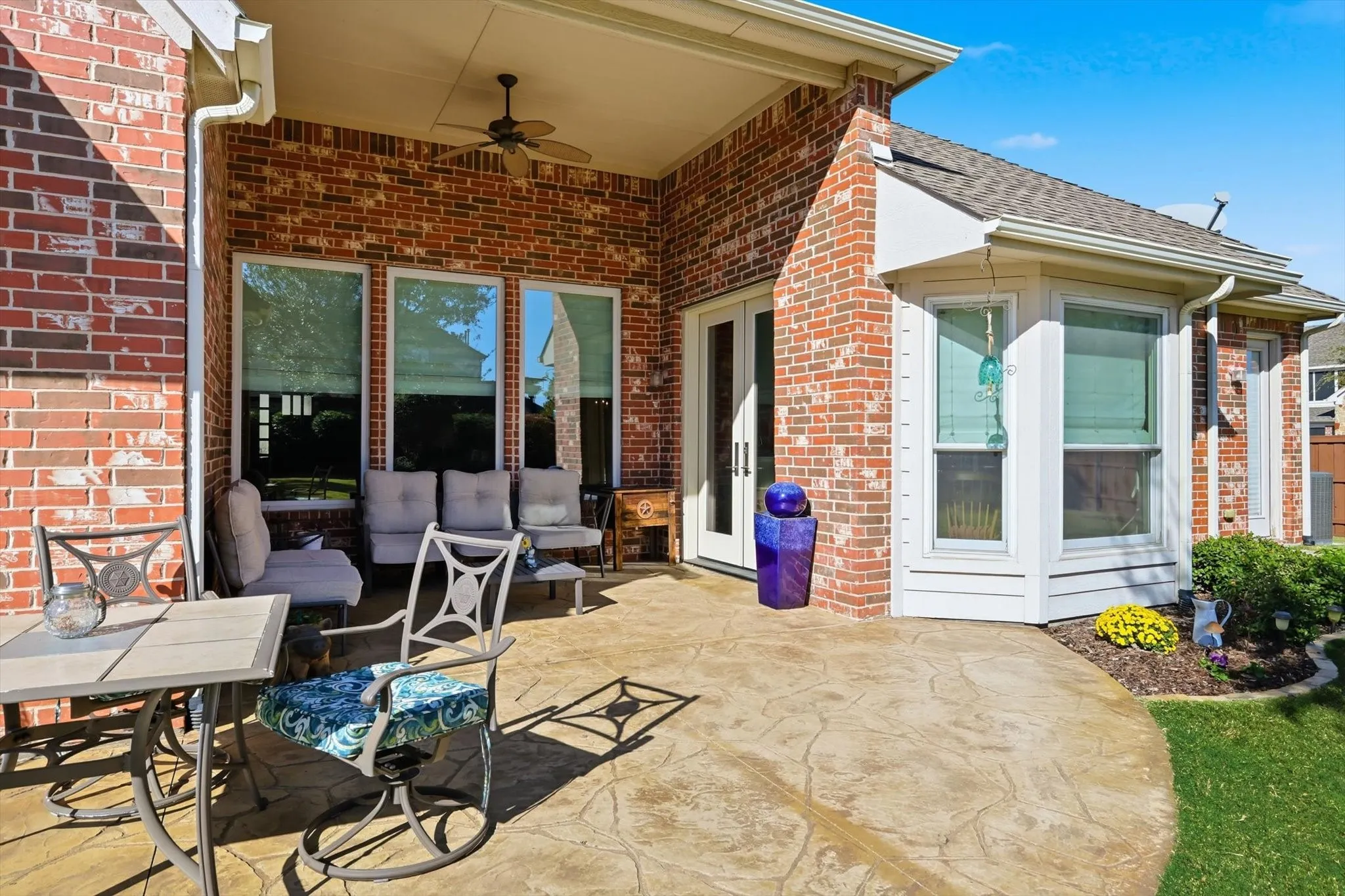 View of patio with a ceiling fan and outdoor lounge area