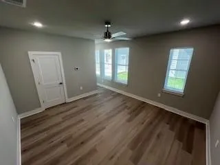 Both bedroom in 4 bedroom unit with lots of windows