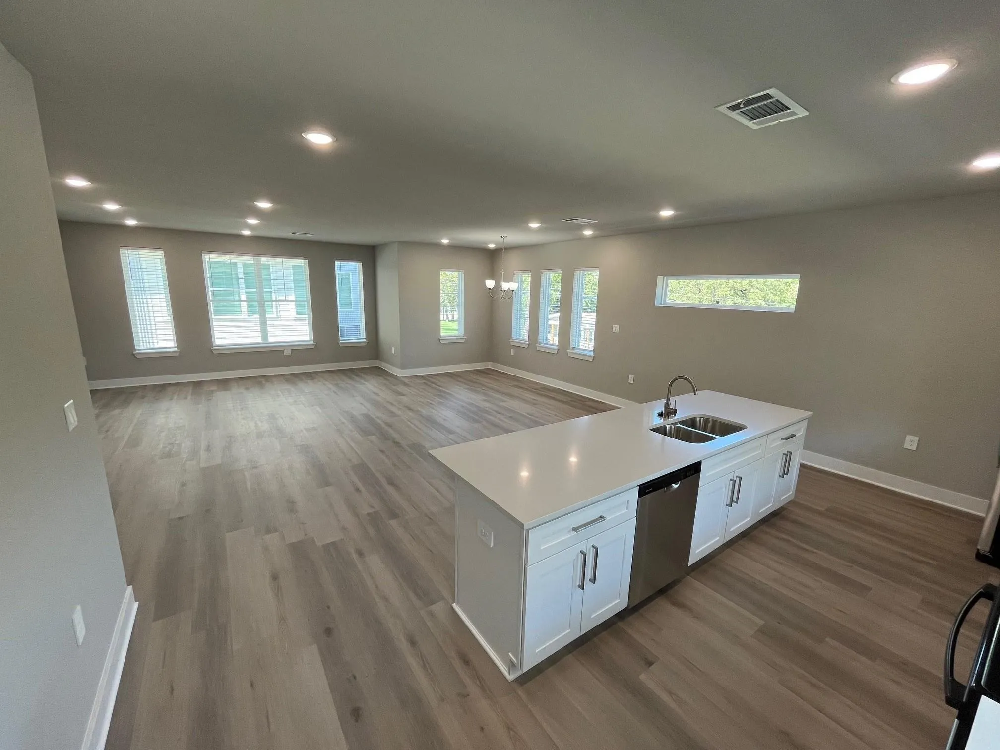 Kitchen in 4 bedroom unit with lots of counter space and granite counter tops