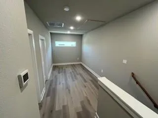 Hallway and media area in 4 bedroom on 3rd floor