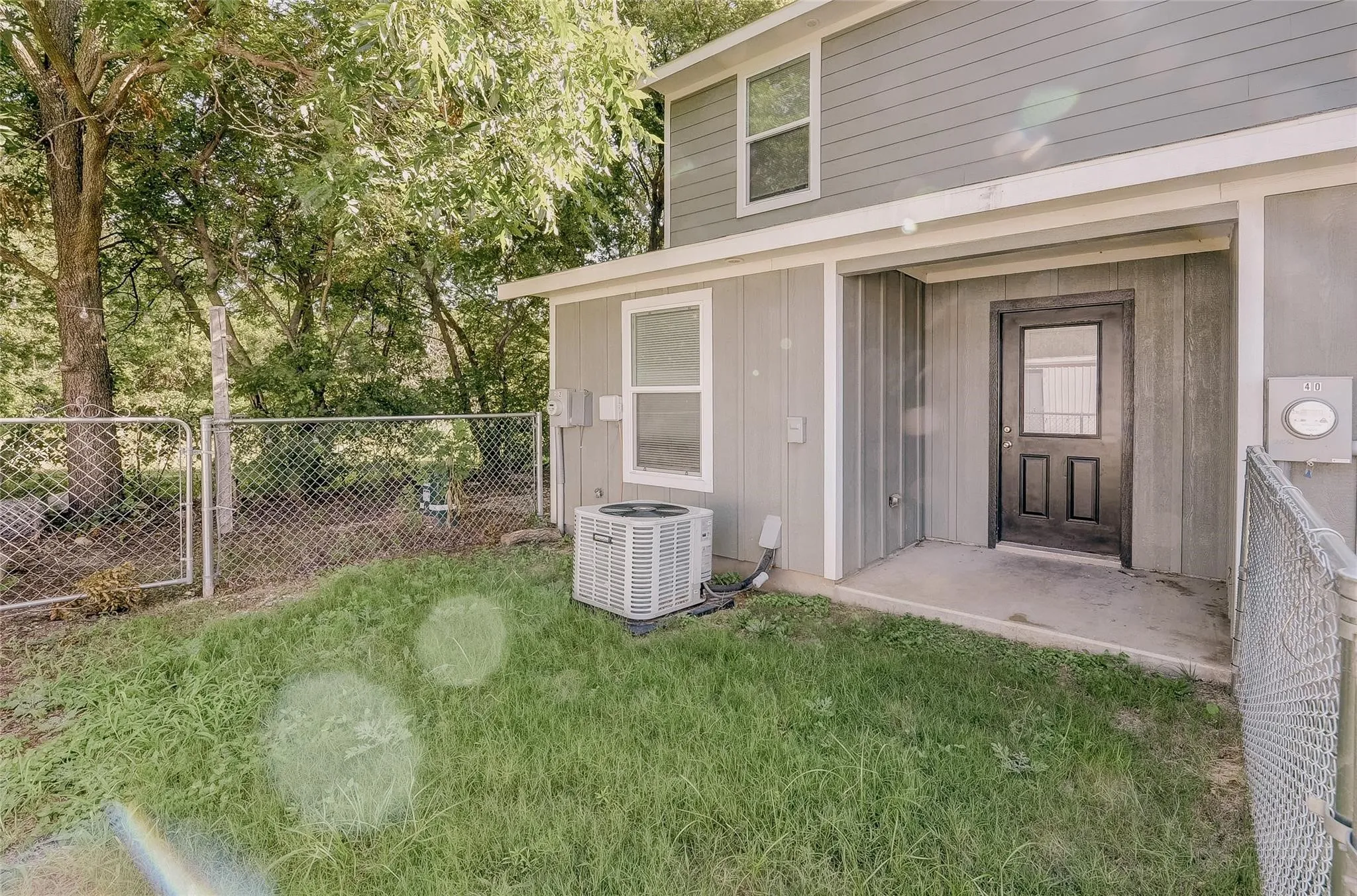 Back yard with covered porch area