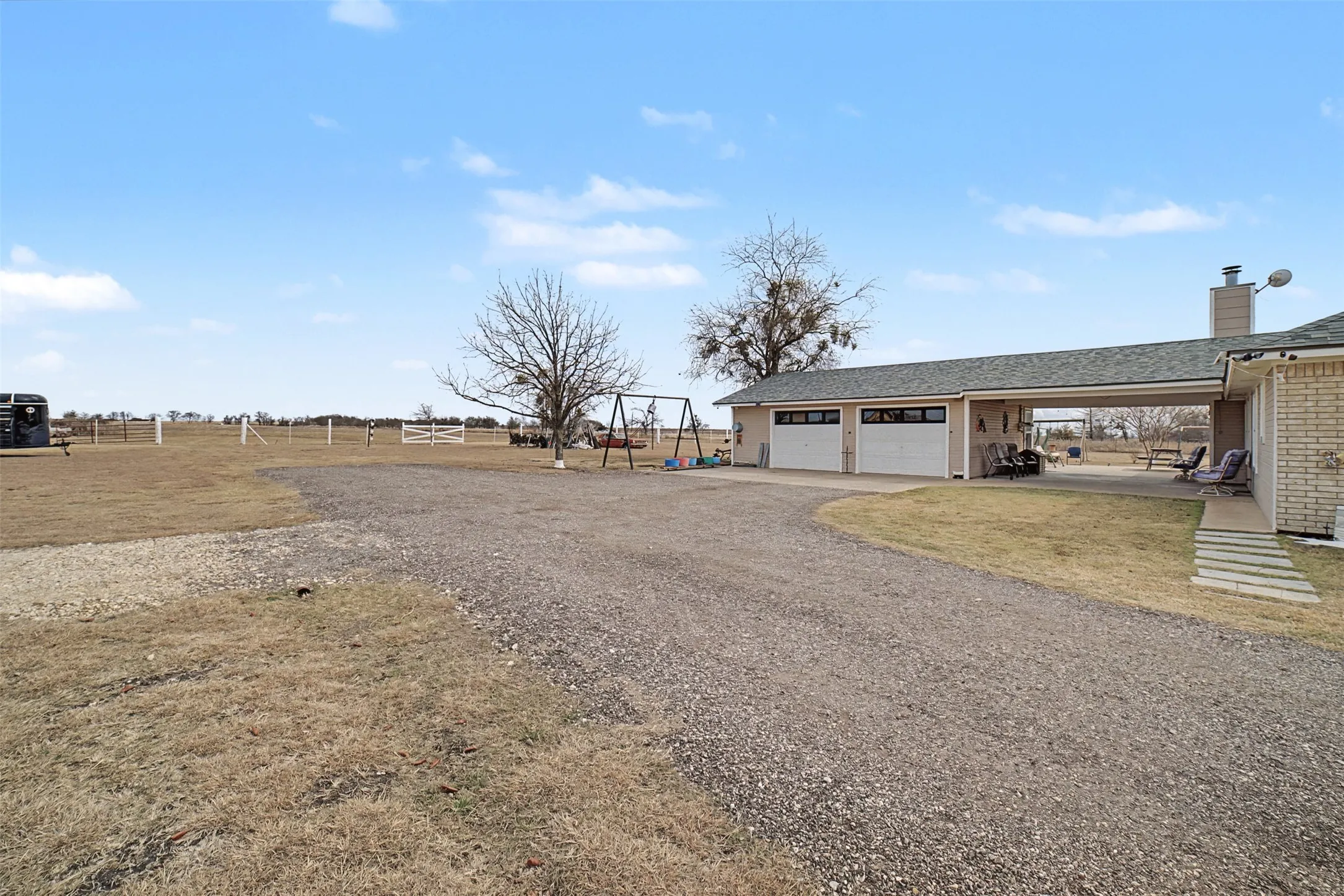 facing garage and back property on right side