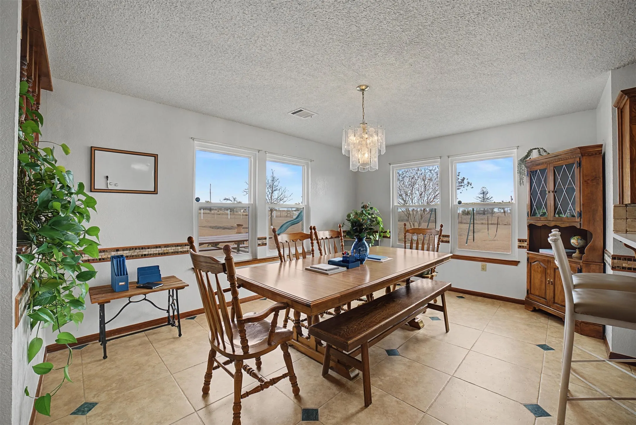 Dining room can easily transfer into workroom or breakroom