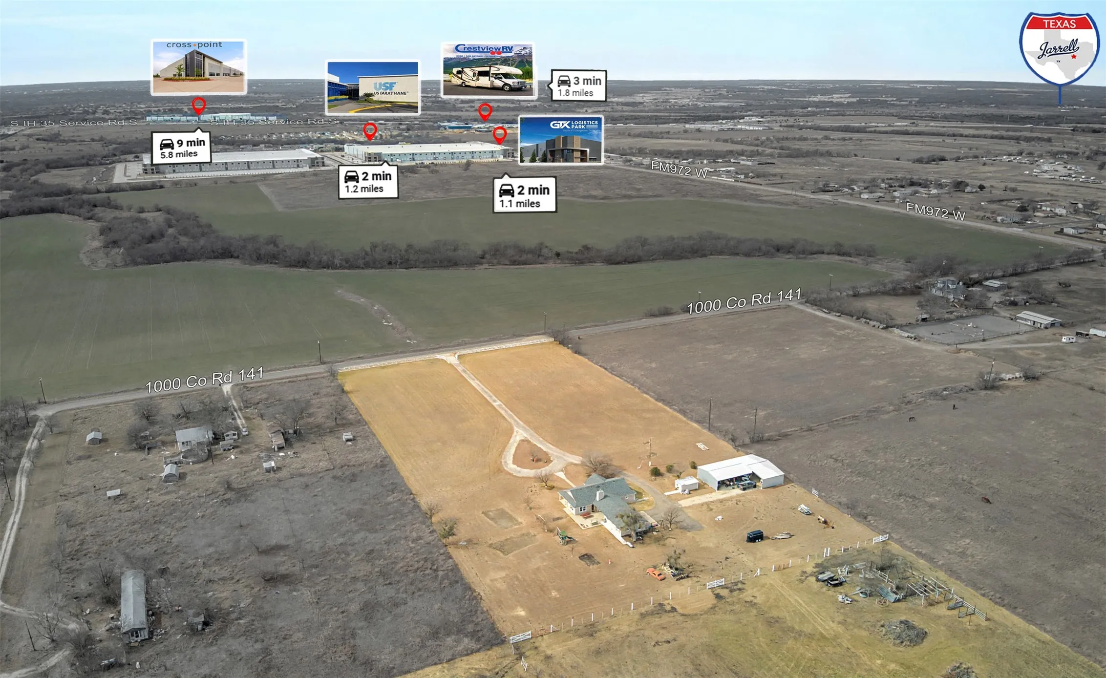 Aerial view facing west towards I-35 and various commercial businesses