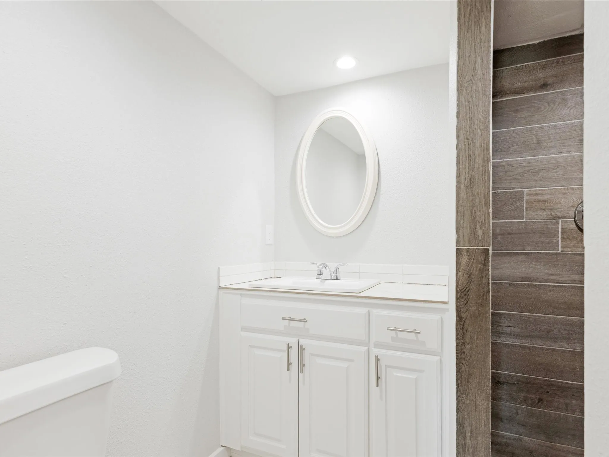Bathroom with vanity and toilet