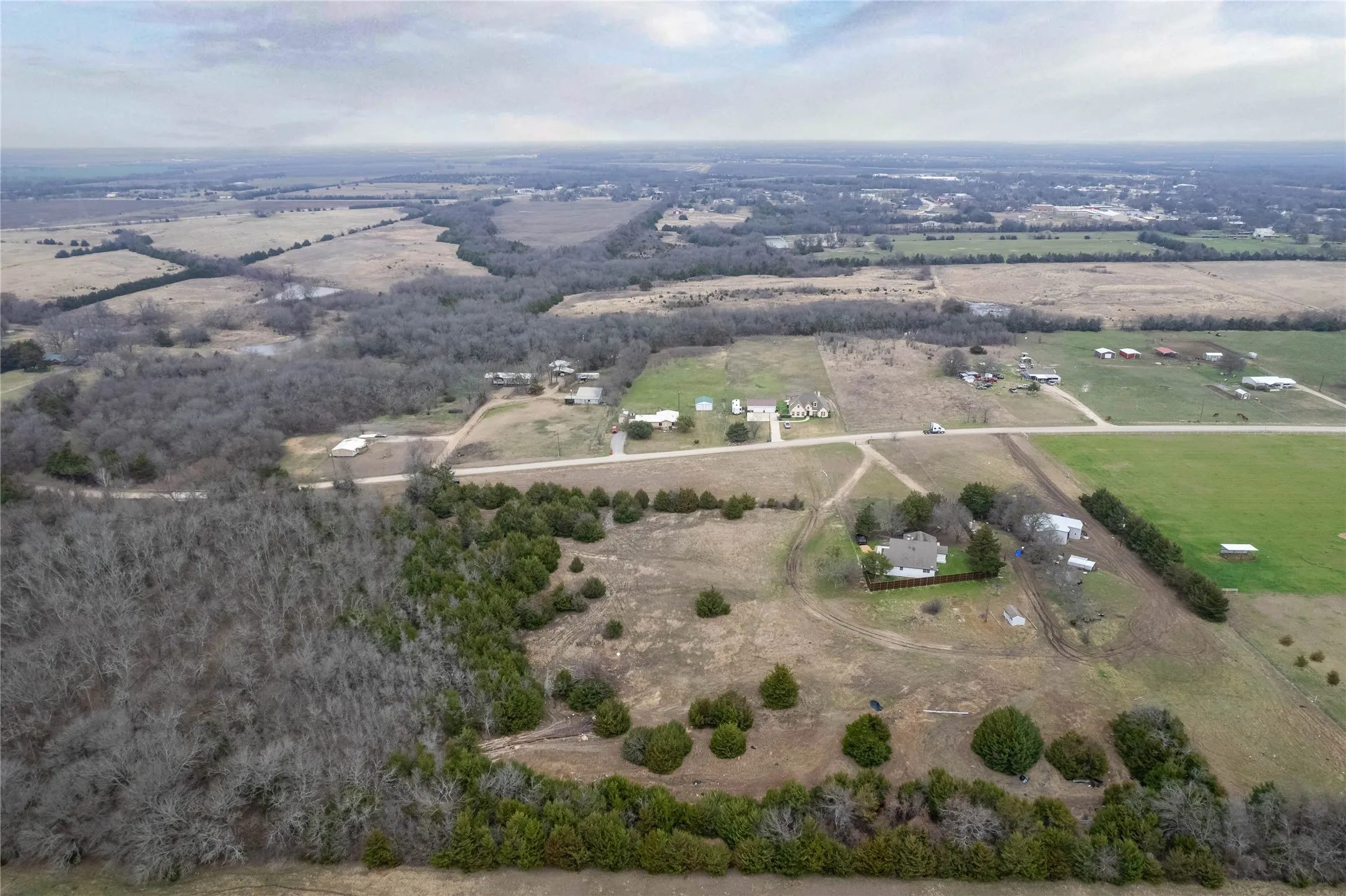 Aerial view of property's location featuring rural landscape