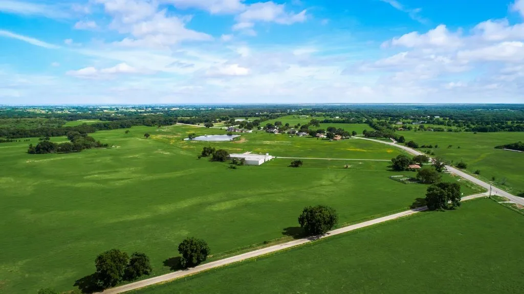 Overview of rural landscape featuring a pastoral area