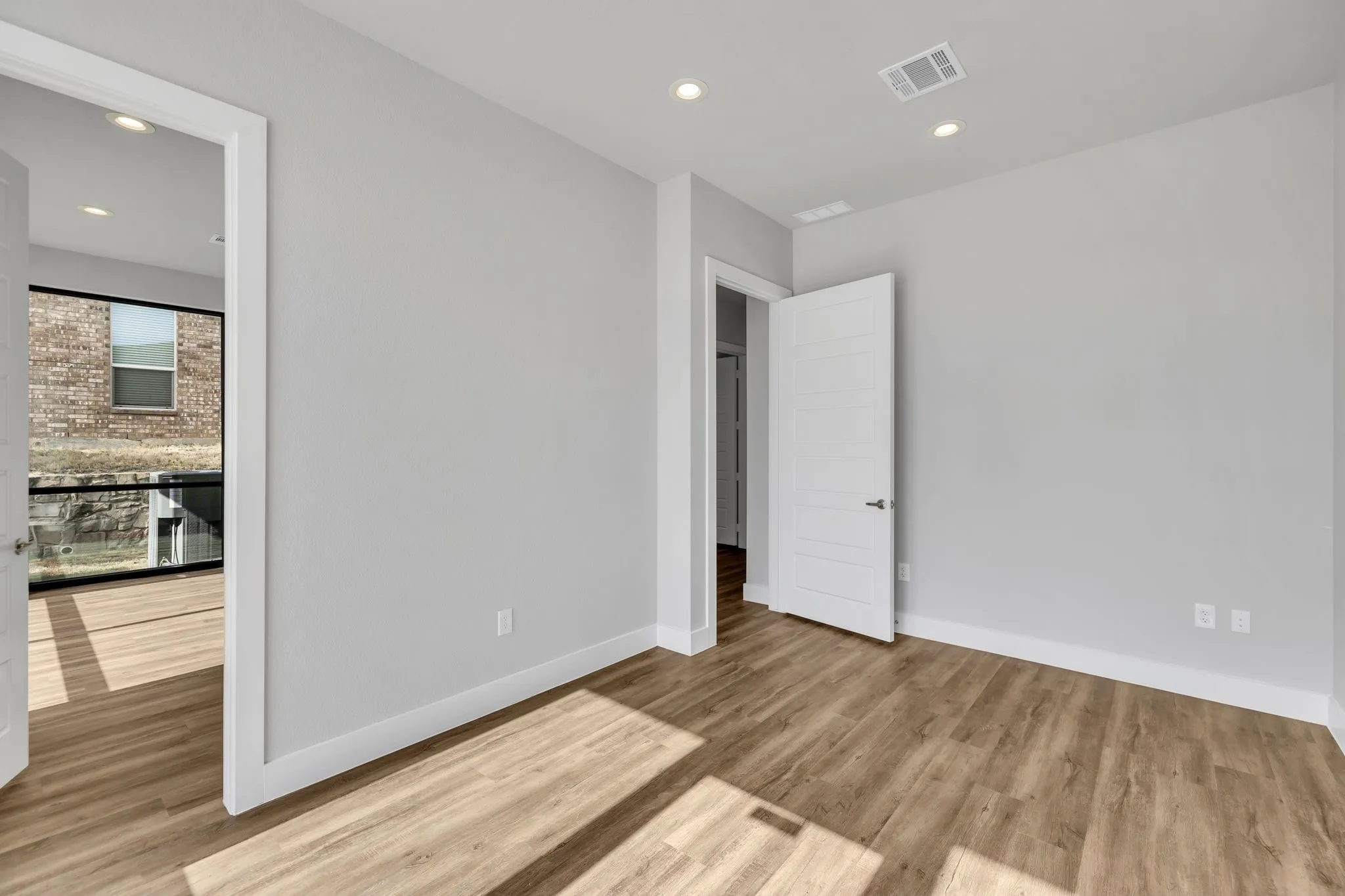 Unfurnished bedroom featuring recessed lighting and light wood finished floors