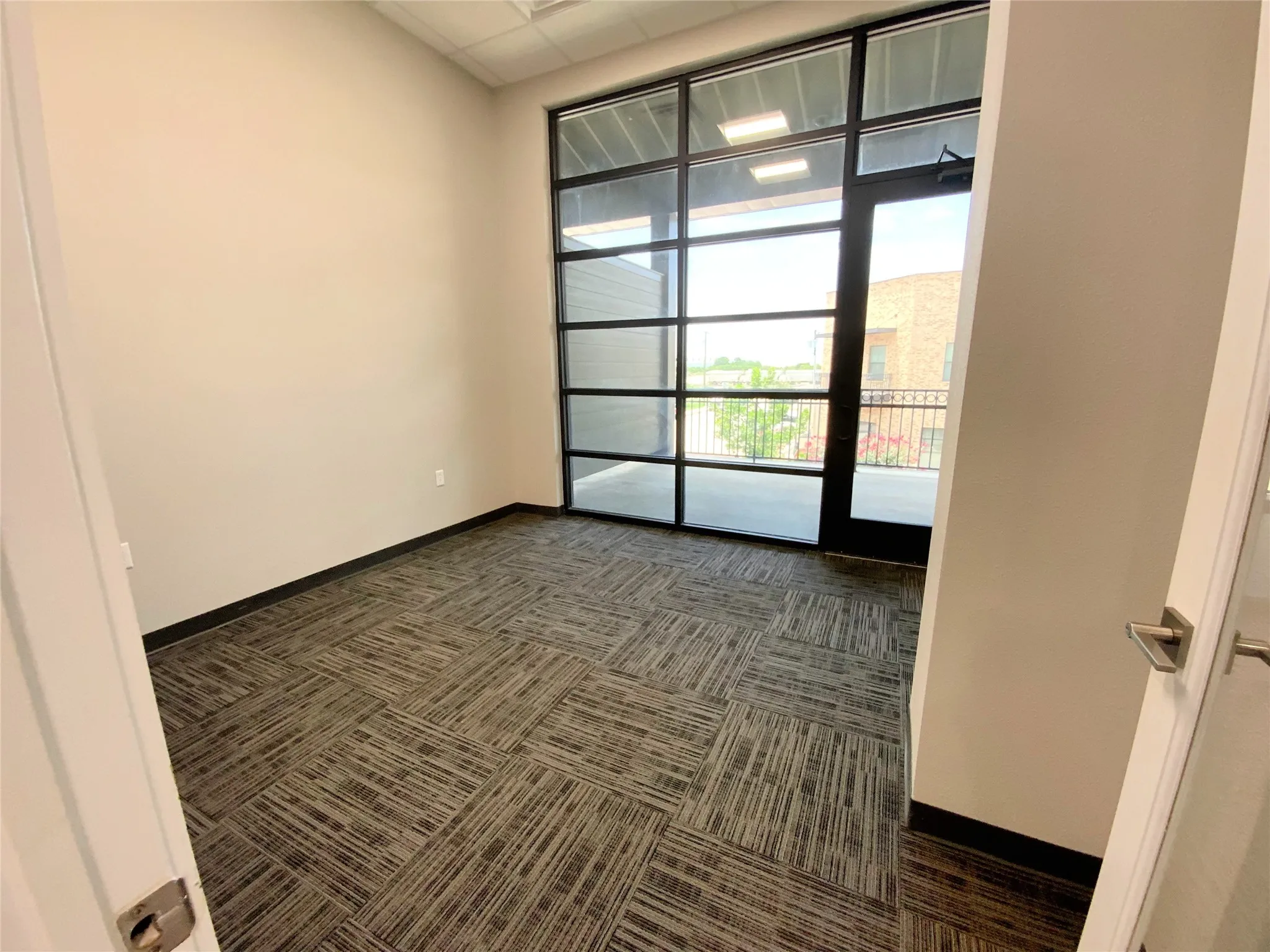 Private office 2 with balcony and view of Oak St.