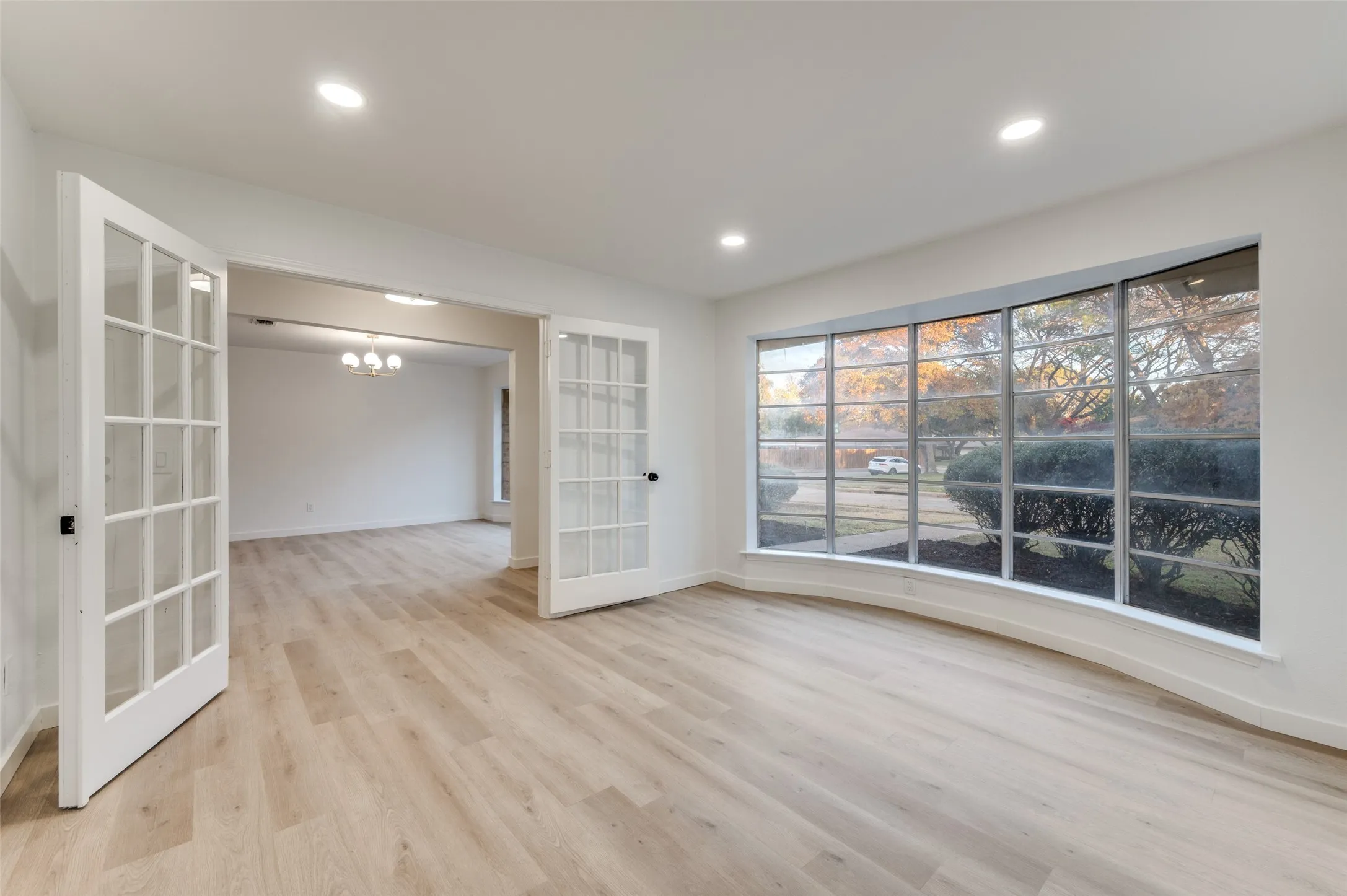 The French doors provide ultimate privacy and quiet, while still maintaining elegant sightlines into the dining area.