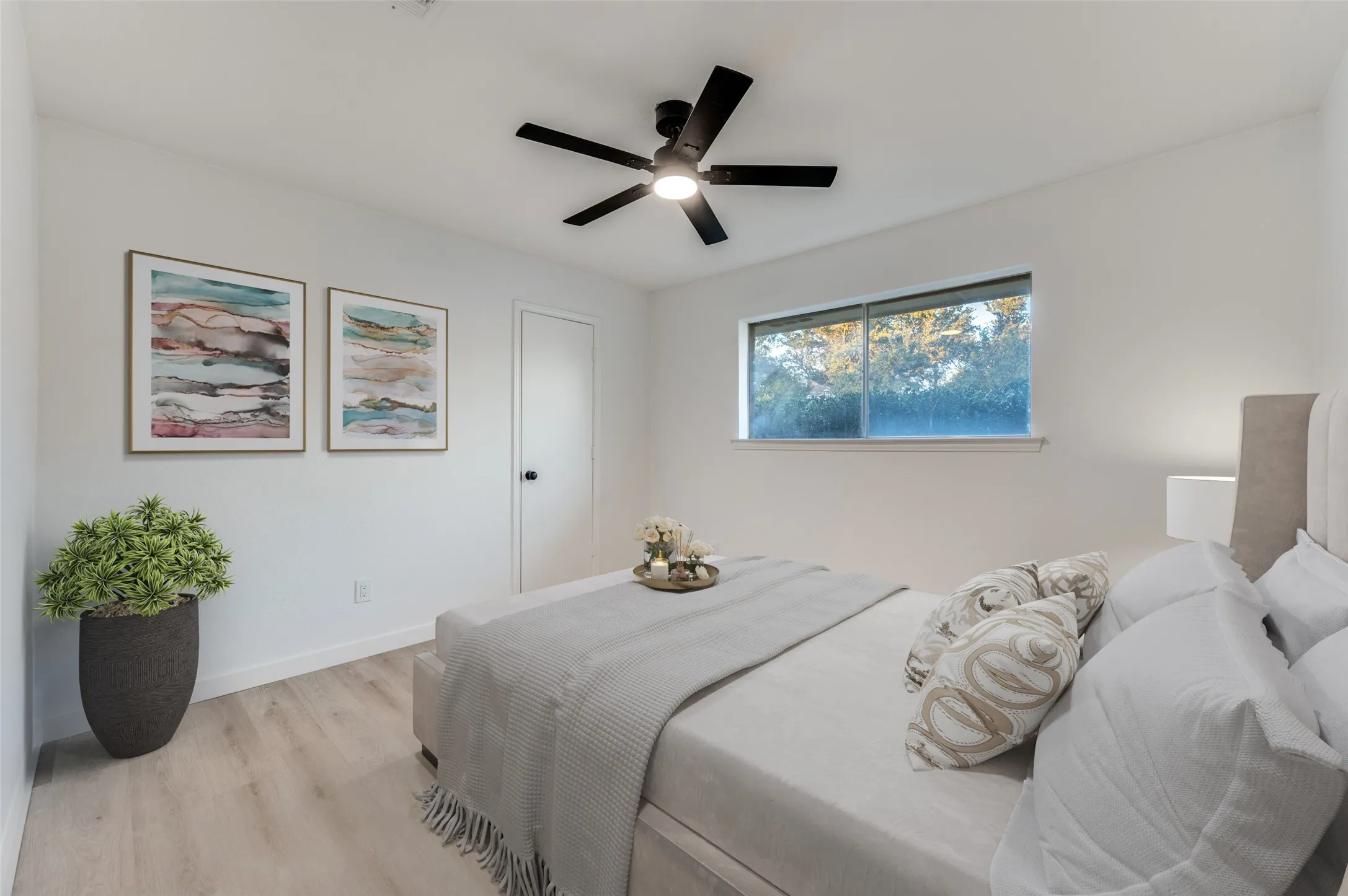 Smartly positioned split bedroom with walk-in closet, offering privacy for guests or flexibility for multi-generational living.