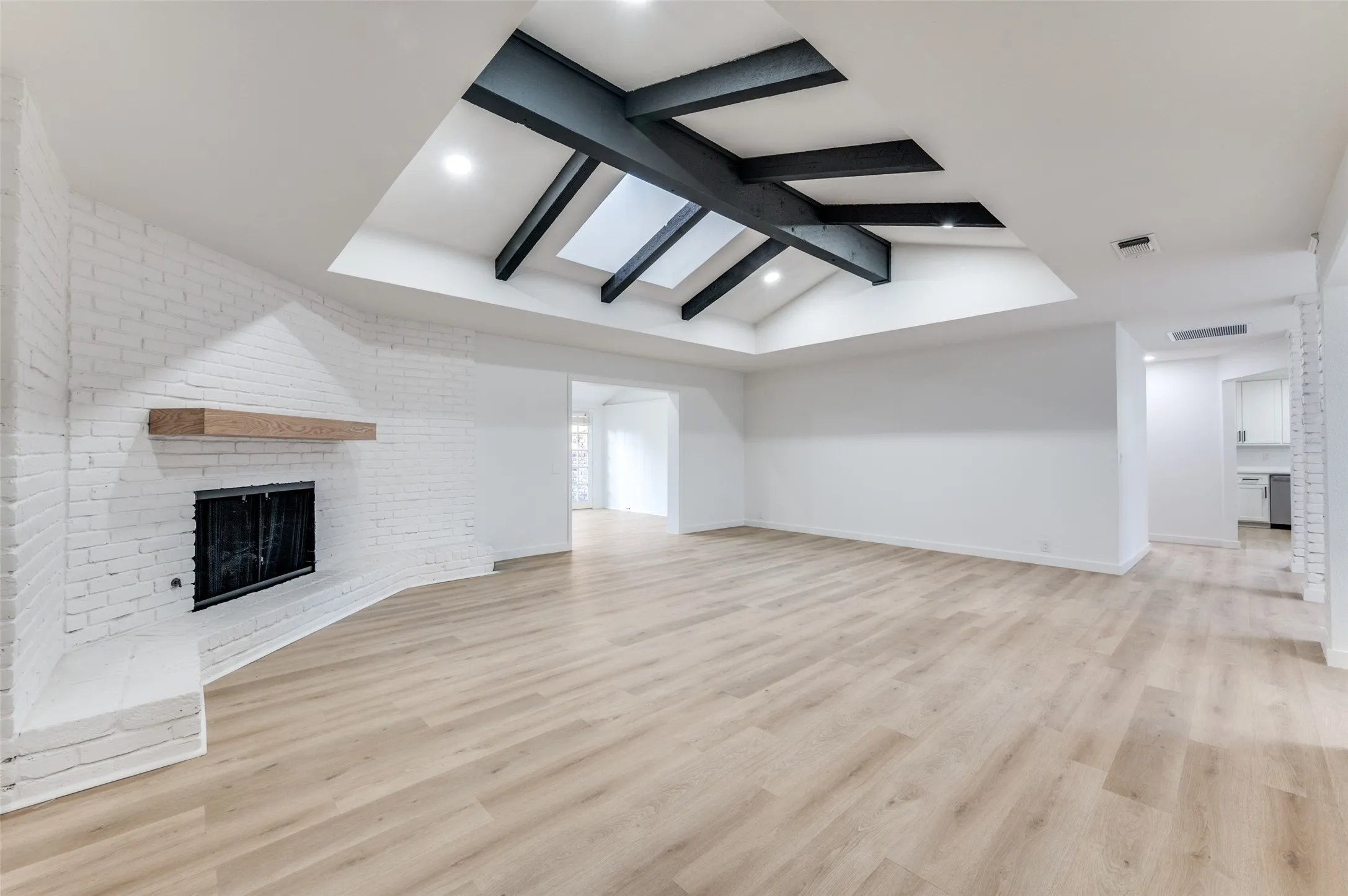The true heart of the home, next to an oversized flex space and with sightlines to the kitchen.