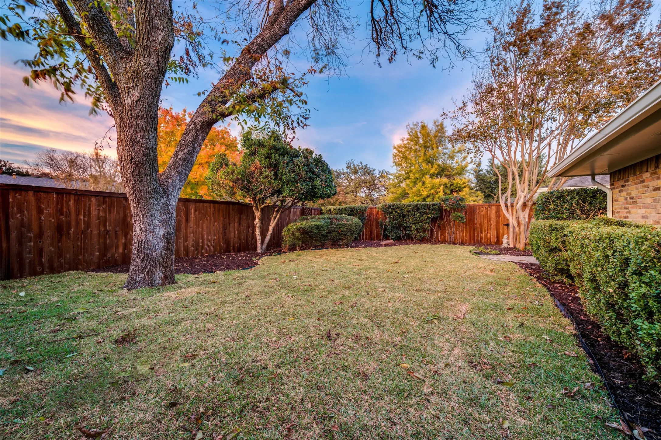 Extensive system upgrades include cast iron plumbing replacement, foundation improvements with transferable lifetime warranty, roof repairs, French drains, sprinkler system, new siding, and fully owned solar panels.