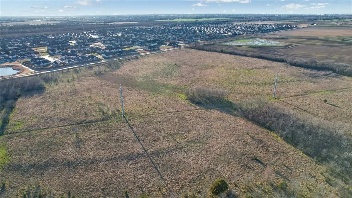 View looking toward Crenshaw Rd, Paula Walker Elementary school and housing additions.
